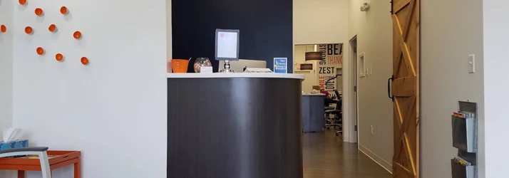 photo depicting the front desk of Olmsted Orthodontics